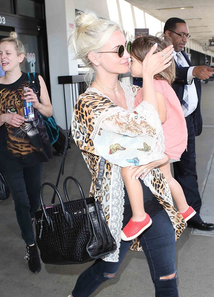 Reference image illustrating Celebrities Spotted with Chanel, Saint Laurent, and Céline Bags This Summer