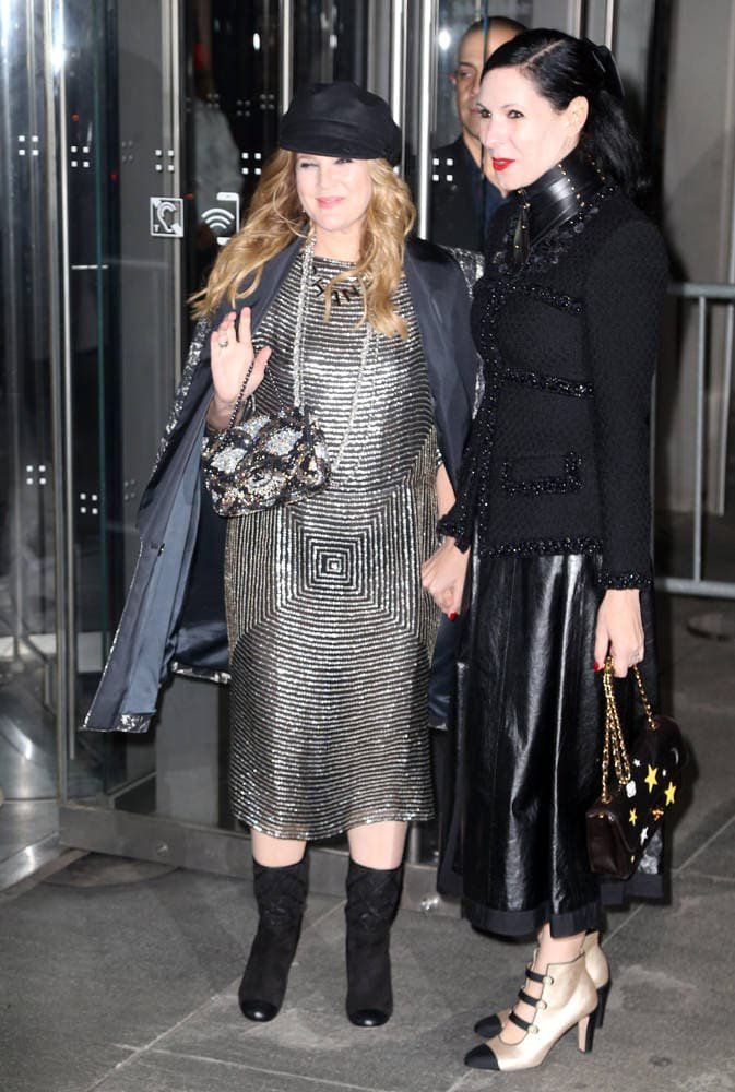 Reference image illustrating Celebrity Airport Style: Chanel, Prada, and Givenchy Bags Spotted Before Holiday Travel