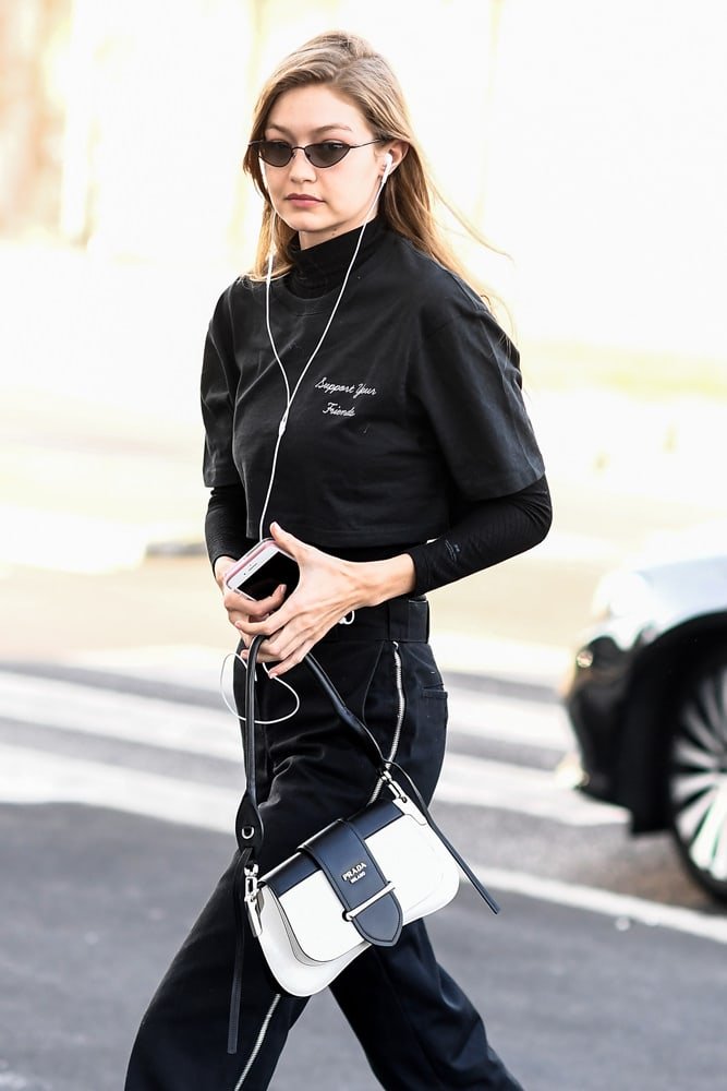 Reference image illustrating Celebrity Handbag Sightings at Men’s Milan and Paris Fashion Weeks: Prada, Chanel, and Vivienne Westwood Steal the Show