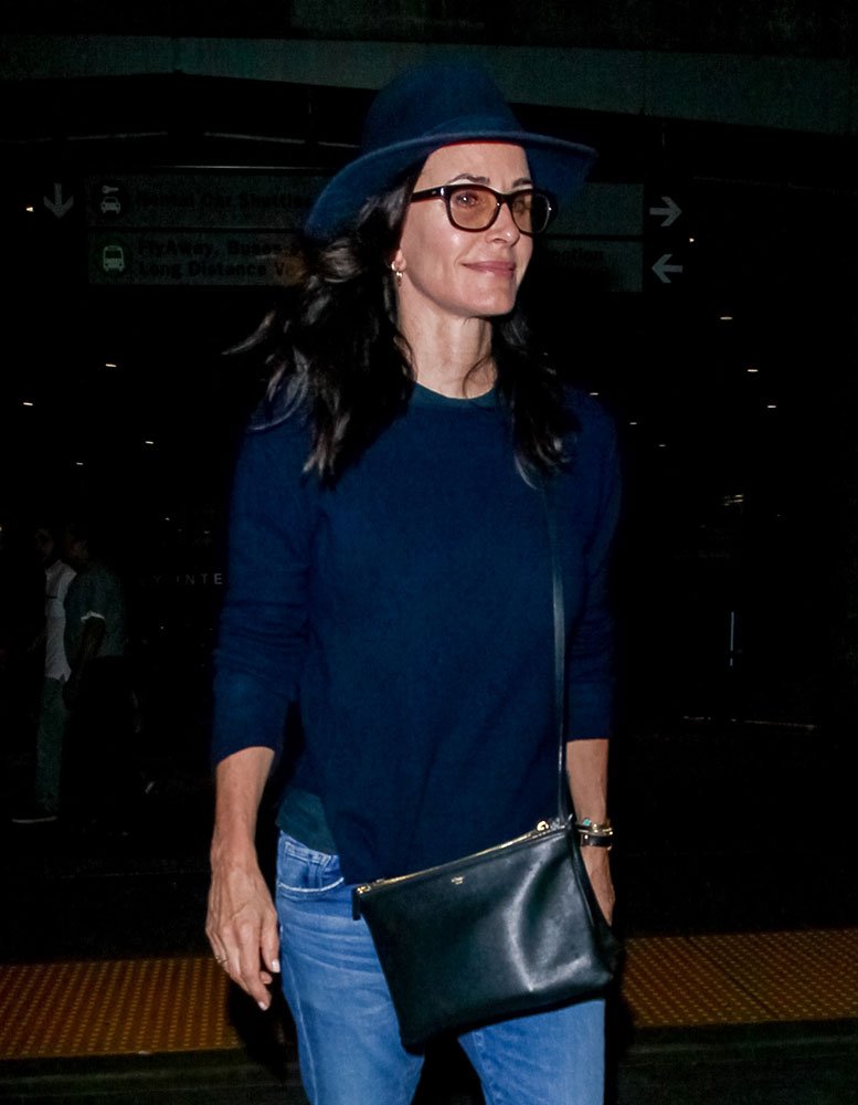 Reference image illustrating Celebrity Handbag Sightings: Chanel, Versace, and Hunting Season Bags Spotted on Summer Errands