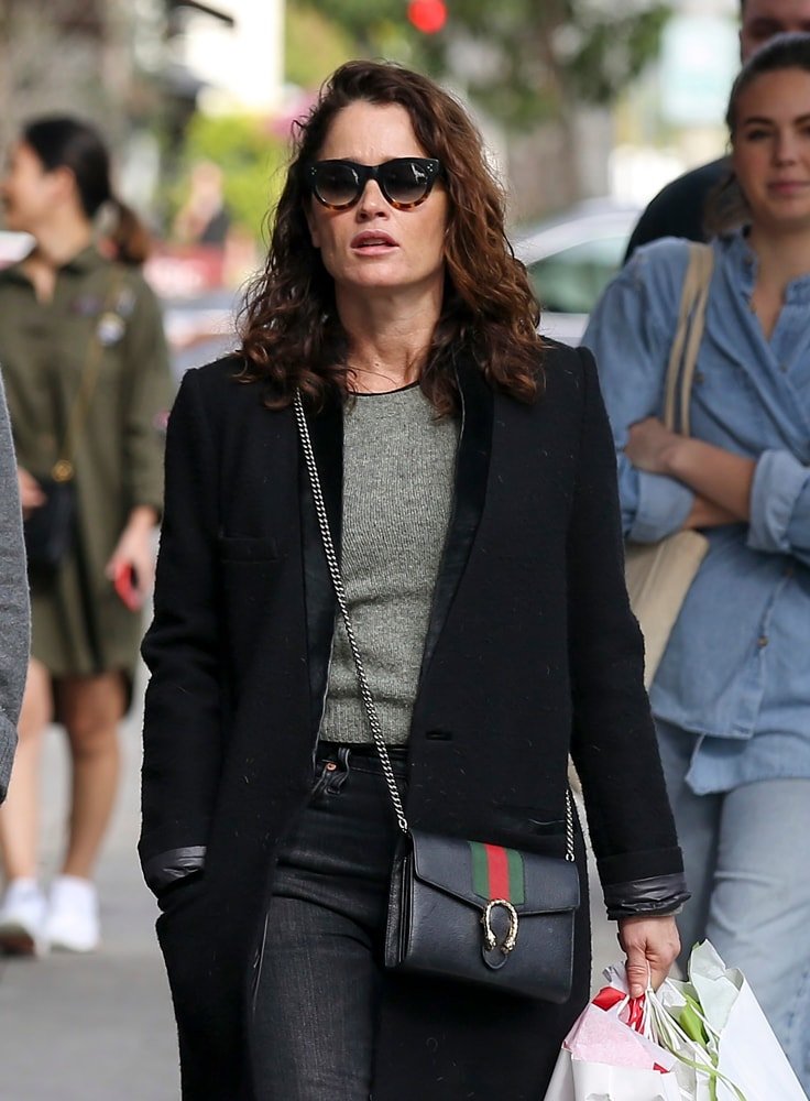 Reference image illustrating Celebrity Handbag Sightings: Queen Elizabeth’s Launer, Bella Hadid’s Dior, and More