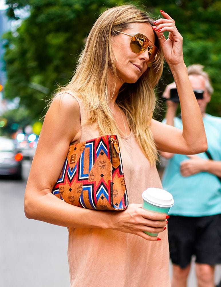 Reference image illustrating Celebrity Handbag Watch: Compact Pouches and Beachy Totes Dominate Summer Style