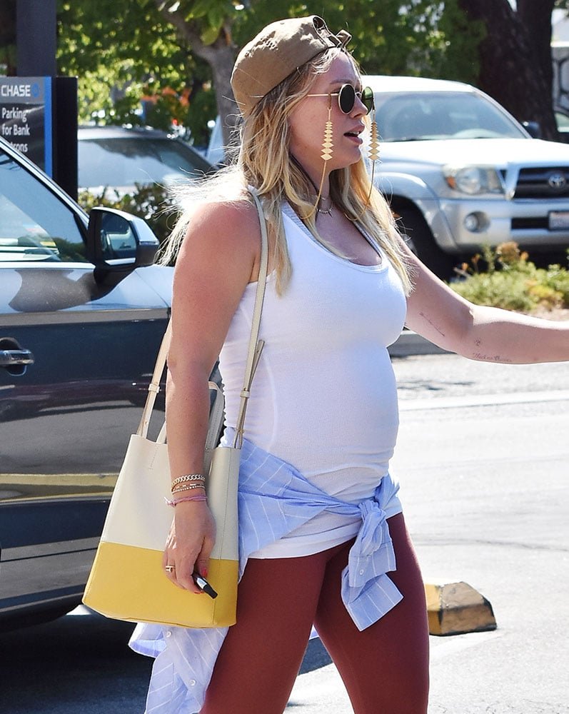 Reference image illustrating Celebrity Handbag Watch: Compact Pouches and Beachy Totes Dominate Summer Style
