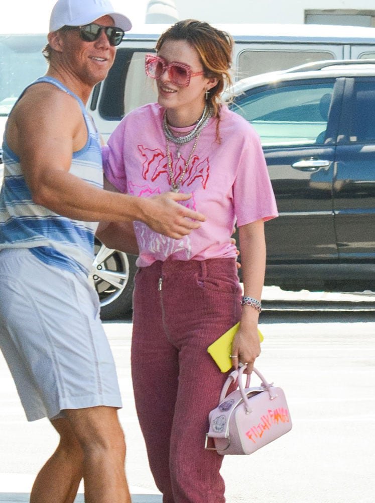 Reference image illustrating Celebrity Handbag Watch: Logo Tees, Wimbledon Style, and Chanel WOCs