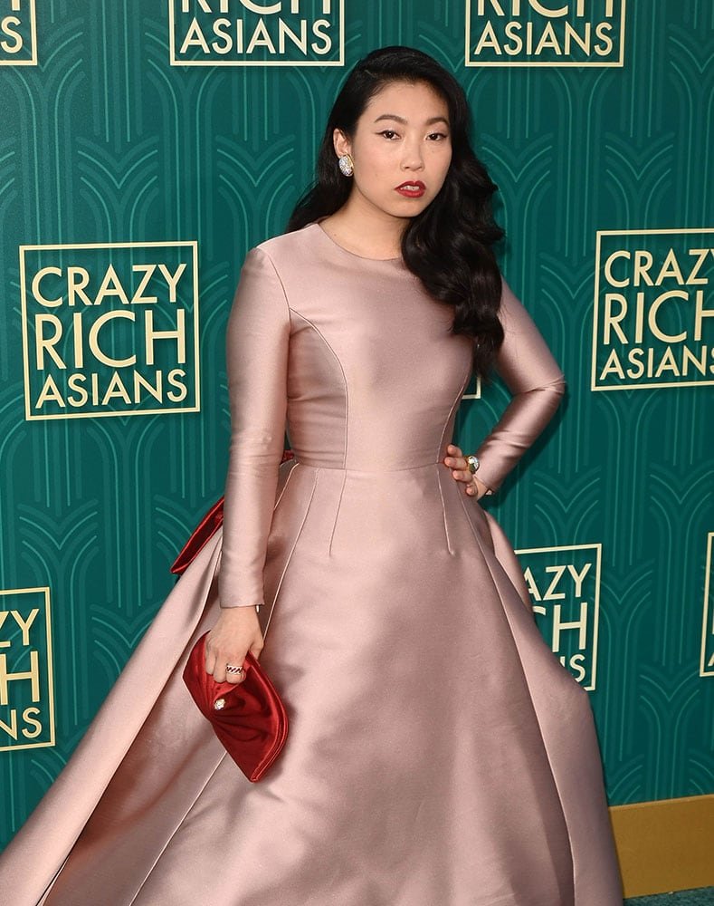Reference image illustrating Celebrity Handbag Watch: Prada Galleria, Mansur Gavriel Tote, and Edie Parker Clutch Spotted on Stars This Week