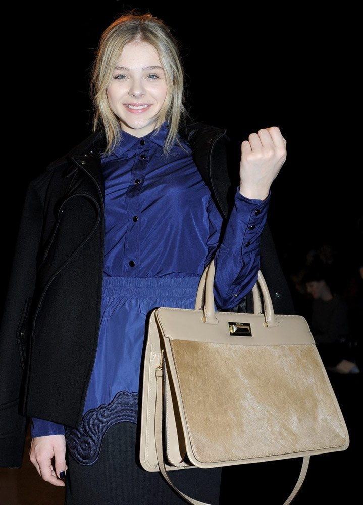 Reference image illustrating Chloë Grace Moretz’s Designer Handbag Collection: From Chanel to Coach
