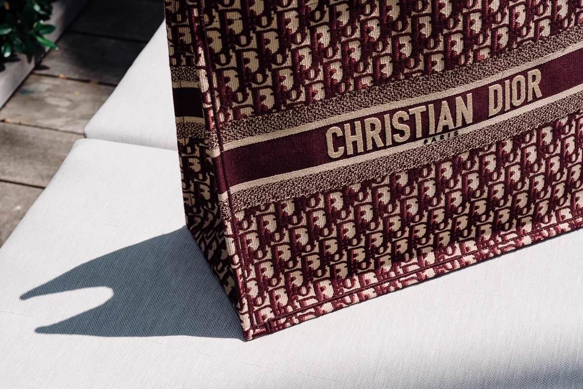Reference image illustrating Dior Book Tote Review: Craftsmanship, Customization, and Why It’s a Travel Favorite