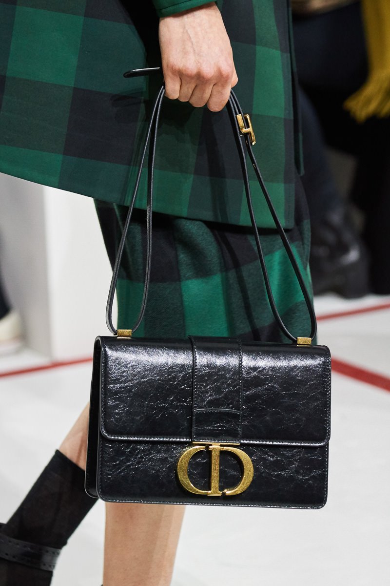 Reference image illustrating Dior Fall 2019 Runway Bags: Logo Mania Meets 90s Grunge