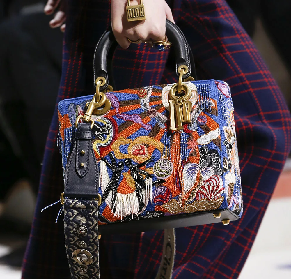 Reference image illustrating Dior Saddle Bag Returns: Fall 2018 Runway Revival and New Handbag Highlights