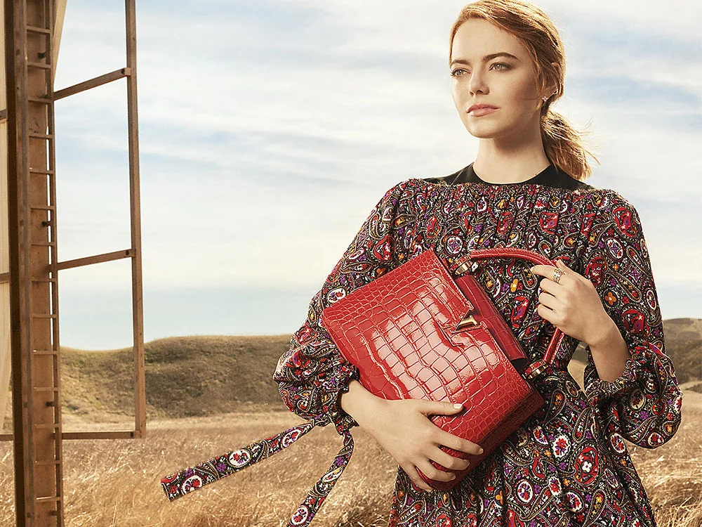 Reference image illustrating Emma Stone Stars in Louis Vuitton’s Capucines Bag Campaign: A Desert Dream