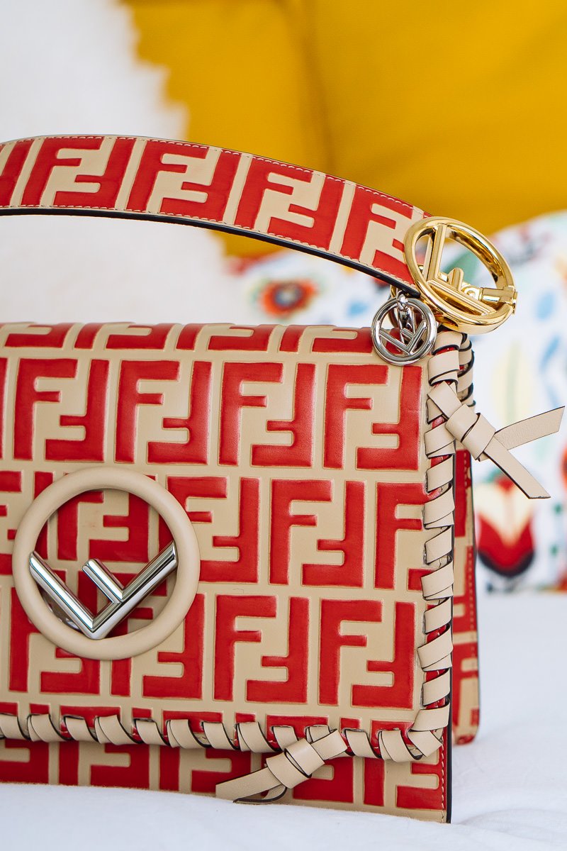 Reference image illustrating Fendi Kan I F Bag Spring 2018: All-Over Logo Leather with Whipstitch Details