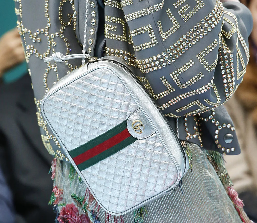 Reference image illustrating Gucci Fall 2018 Bags: Runway First Look at Flap Bags, Basketball Shapes & Nylon Backpacks
