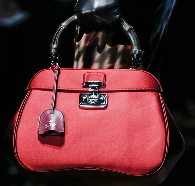 Reference image illustrating Gucci's Matte Black Bamboo Handle: A Modern Twist on a 1947 Icon for Fall 2013
