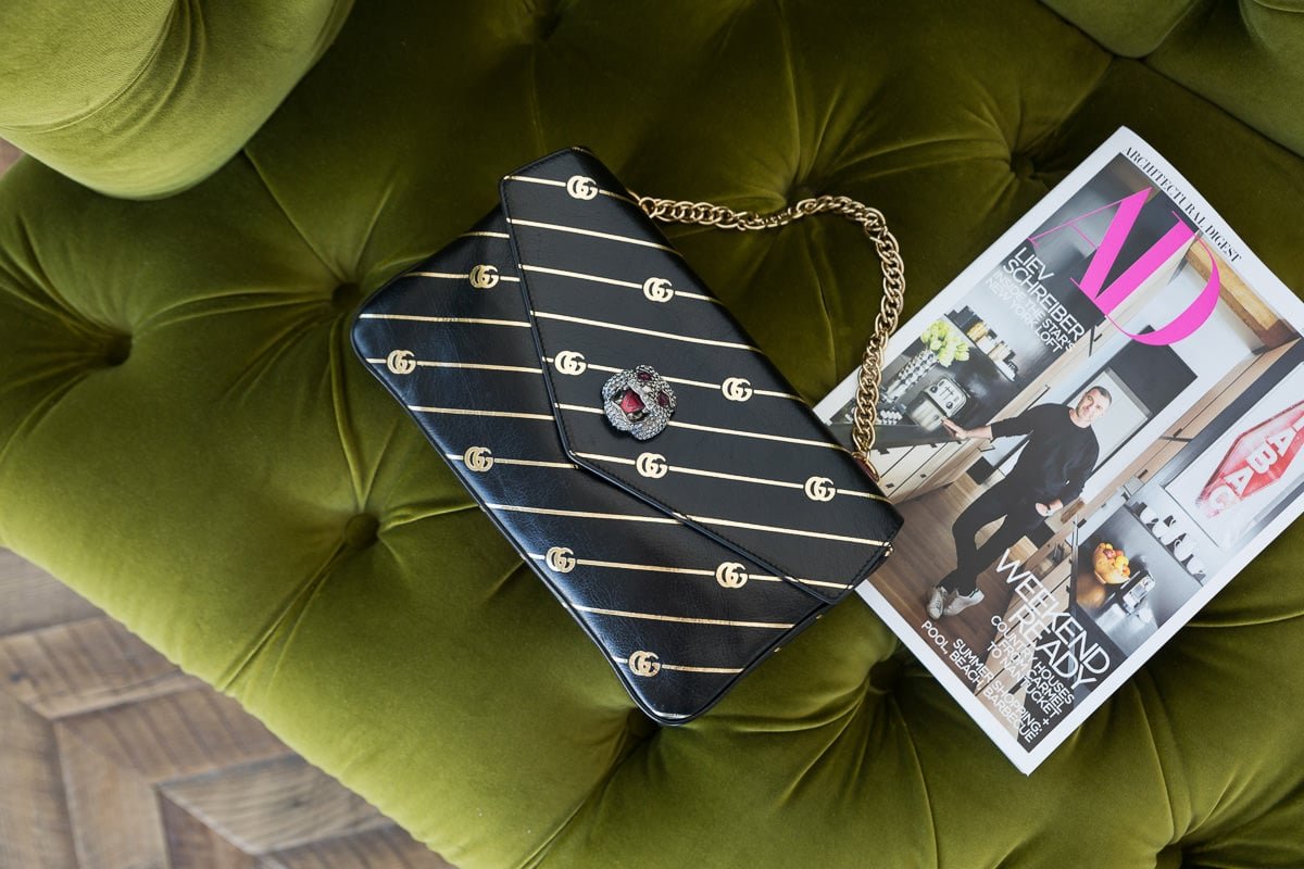 Reference image illustrating Gucci Thiara Medium Double Envelope Shoulder Bag Review: A Two-in-One Reversible Icon