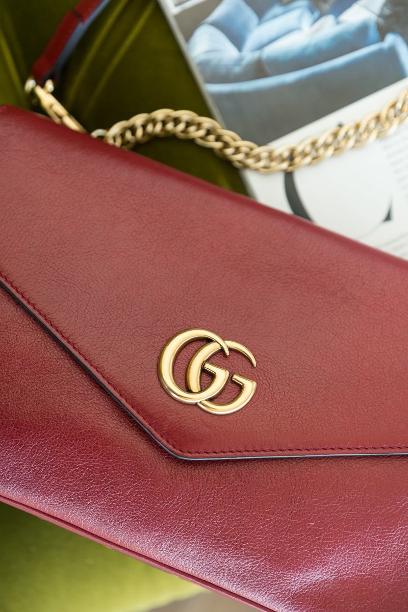 Reference image illustrating Gucci Thiara Medium Double Envelope Shoulder Bag Review: A Two-in-One Reversible Icon
