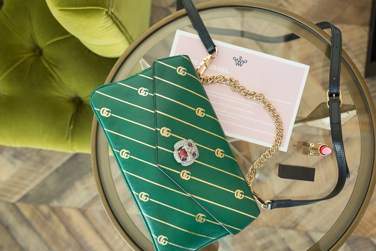 Reference image illustrating Gucci Thiara Medium Double Envelope Shoulder Bag Review: A Two-in-One Reversible Icon