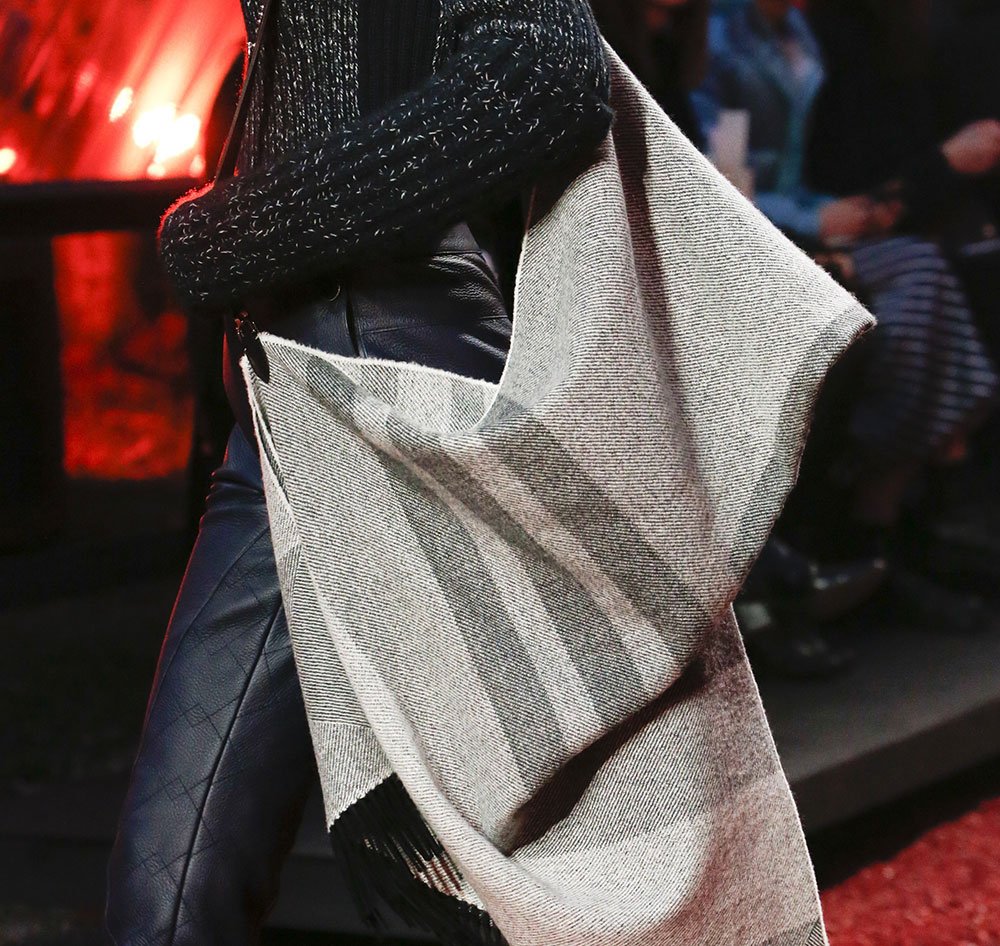 Reference image illustrating Hermès Fall 2018 Runway: Autumnal Hues, Exotic Leathers, and Retro Frame Clutches