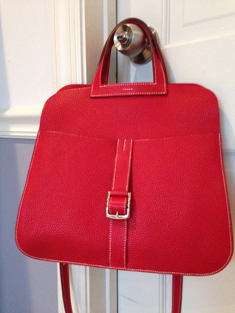Reference image illustrating Hermès Halzan Bag: A Modern Four-Way Design in Clemence Leather