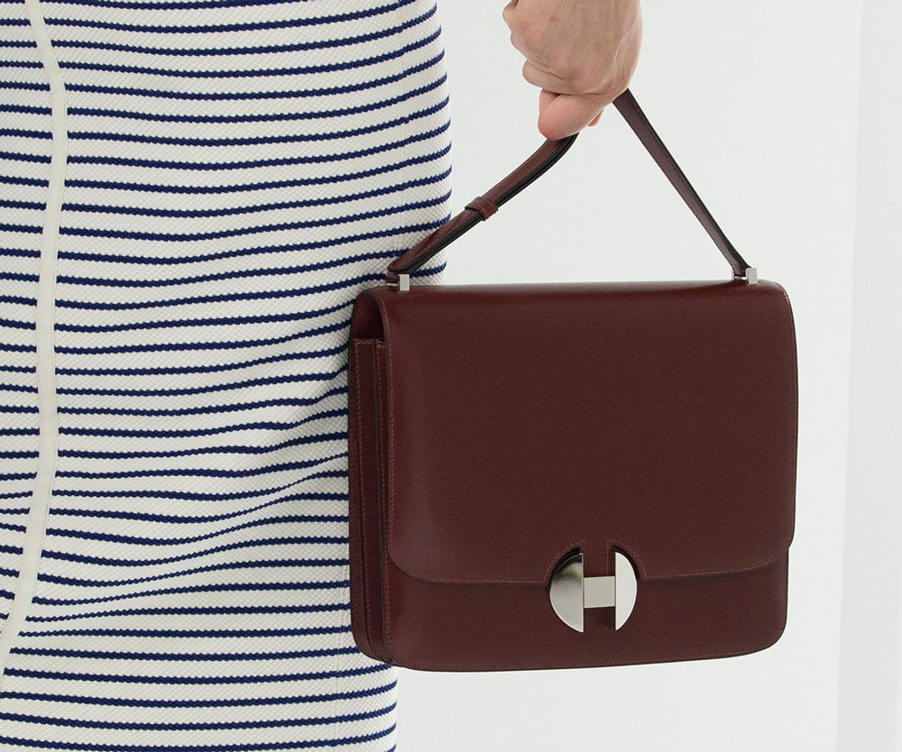 Reference image illustrating Hermès Spring 2018 Runway Debuts the Structured 2002 Shoulder Bag