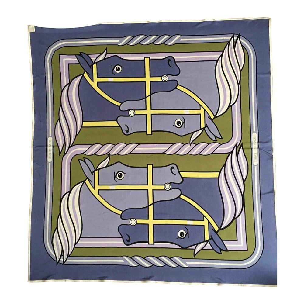 Reference image illustrating How to Elevate Your Luxury Handbag with Scarves and Charms: A Style Guide