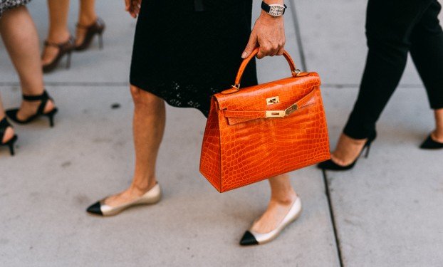 Inside the Hermès Paris Line-Sitting Economy: Wealthy Buyers Pay Hundreds to Skip the Queue at Faubourg Saint-Honoré cover image