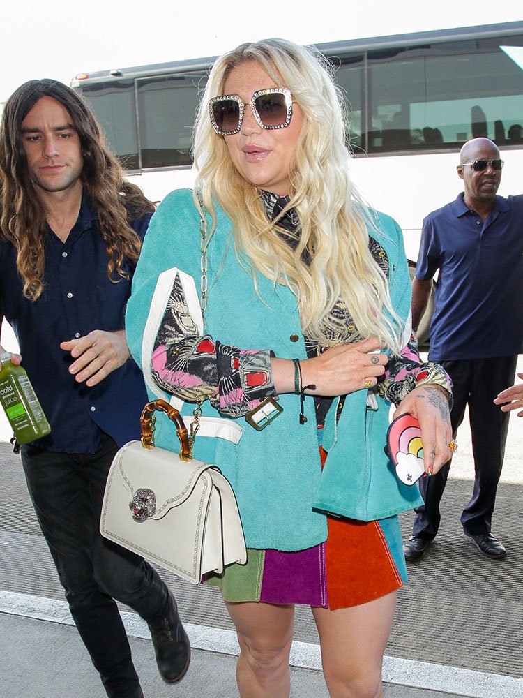 Reference image illustrating Kesha’s Gucci Frame Bag: A Celebrity Style Study in White Leather and Bamboo