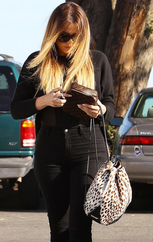 Reference image illustrating Khloe Kardashian’s Luxury Handbag Collection: Every Birkin, Chanel & Celine She Carries