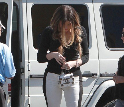 Khloe Kardashian Spotted with Chanel Lego Mini Flap Bag While Filming in Studio City thumbnail
