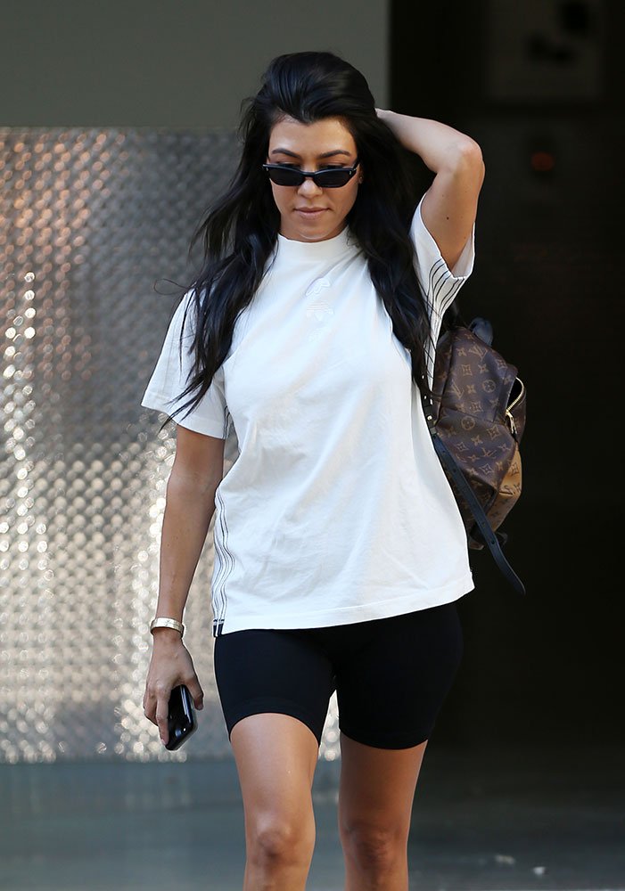 Reference image illustrating Kourtney Kardashian’s Mini Backpack Obsession: Louis Vuitton & Prada Styles She Wears on Repeat