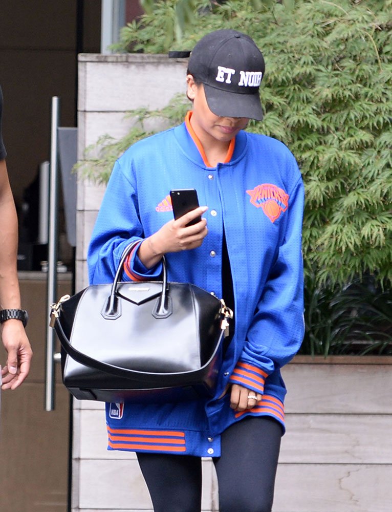 Reference image illustrating La La Anthony’s Givenchy Antigona Collection: A Courtside Style Icon