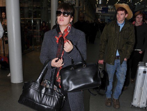 Lily Allen Doubles Up on Chanel Coco Cocoon and Saint Laurent Classic Duffel Bags at St. Pancras thumbnail