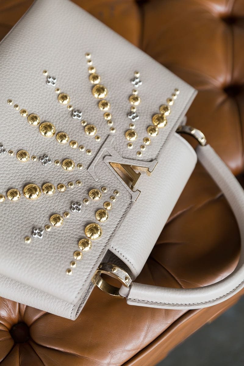 Reference image illustrating Louis Vuitton Capucines BB Review: Sun-Ray Studs and Taurillon Leather Craftsmanship