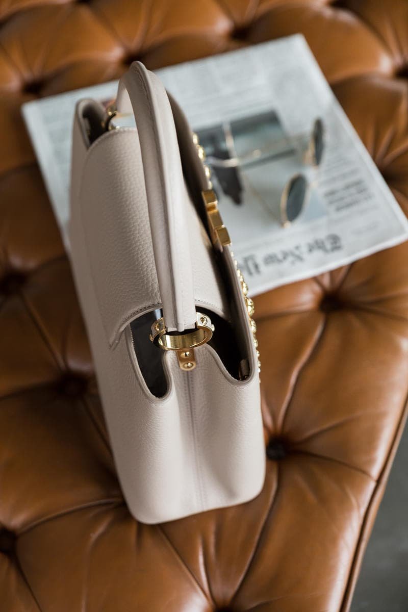 Reference image illustrating Louis Vuitton Capucines BB Review: Sun-Ray Studs and Taurillon Leather Craftsmanship