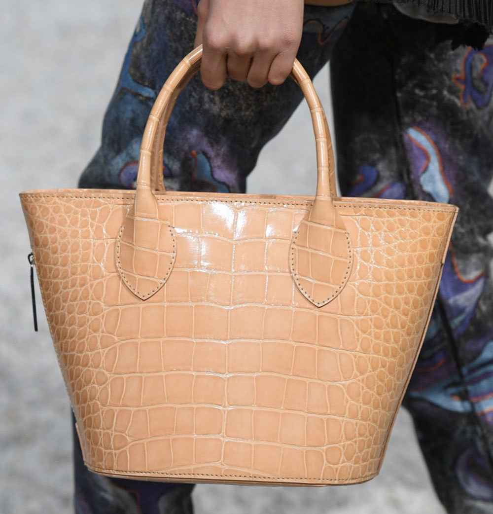Reference image illustrating Louis Vuitton Cruise 2019 Bags: Grace Coddington Cat Collaboration & More Runway Highlights