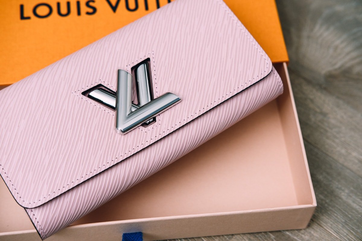 Reference image illustrating Louis Vuitton Twist Wallet Review: Rose Ballerine Epi Leather in Action