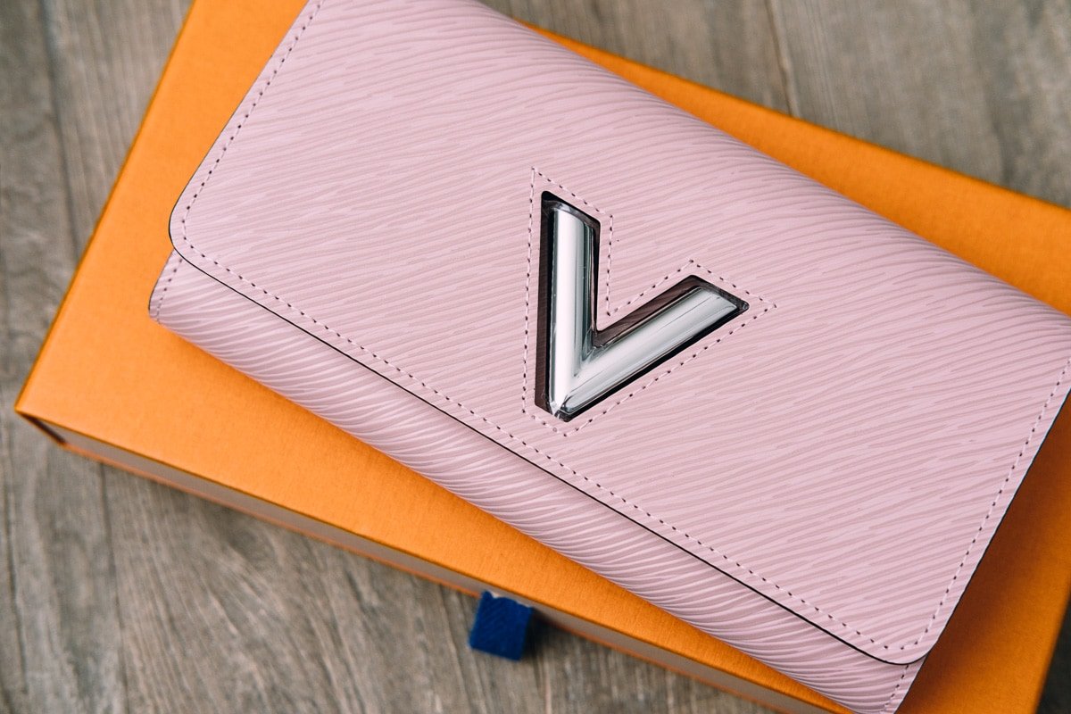 Reference image illustrating Louis Vuitton Twist Wallet Review: Rose Ballerine Epi Leather in Action
