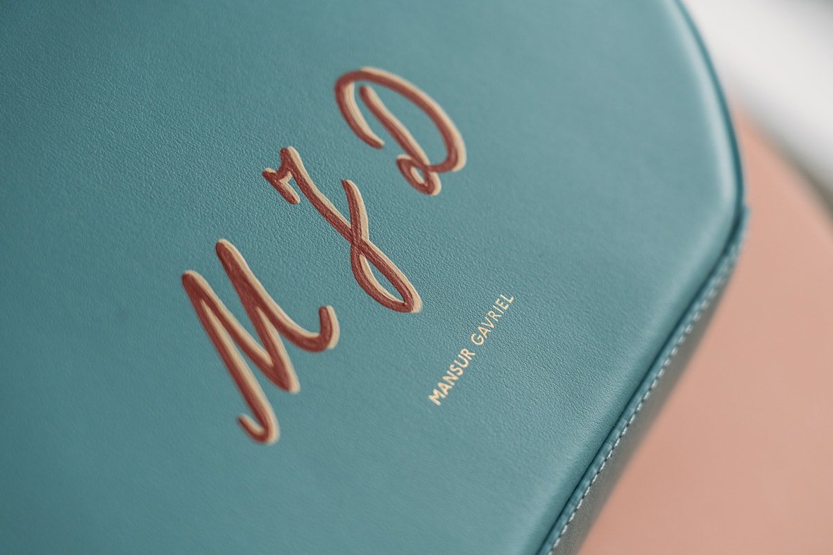 Reference image illustrating Mansur Gavriel Monogramming Service: Hand-Painted Personalization for Your Luxury Bag