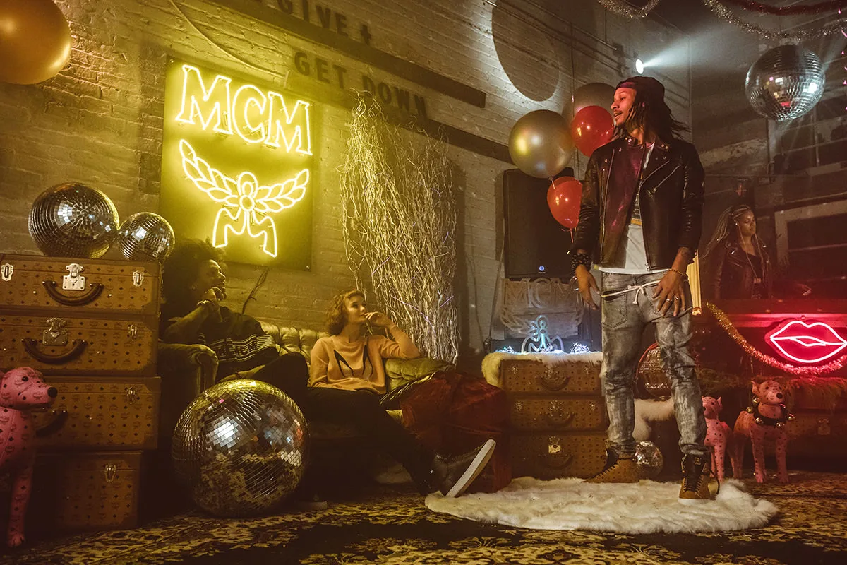 Reference image illustrating MCM Holiday Campaign 2017: The Give & Get Down Party with Kacy Hill and Les Twins