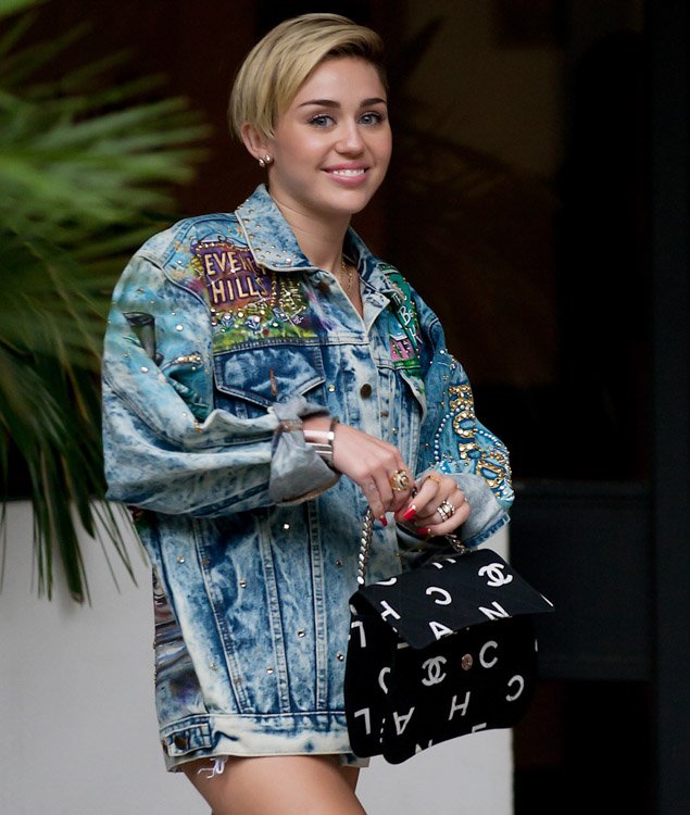 Reference image illustrating Miley Cyrus's Vintage Chanel and Designer Handbag Collection: A Style Analysis