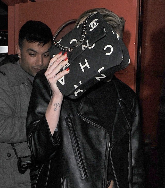 Reference image illustrating Miley Cyrus's Vintage Chanel and Designer Handbag Collection: A Style Analysis