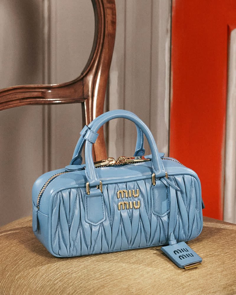Reference image illustrating Miu Miu Matelassé Spring 2026: New Mango Green and Wave Blue Colors Refresh the Wander and Arcadie Bags
