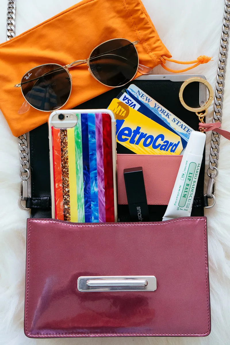 Reference image illustrating Prada Cahier Small Crossbody Bag: What Fits Inside This Mini Icon