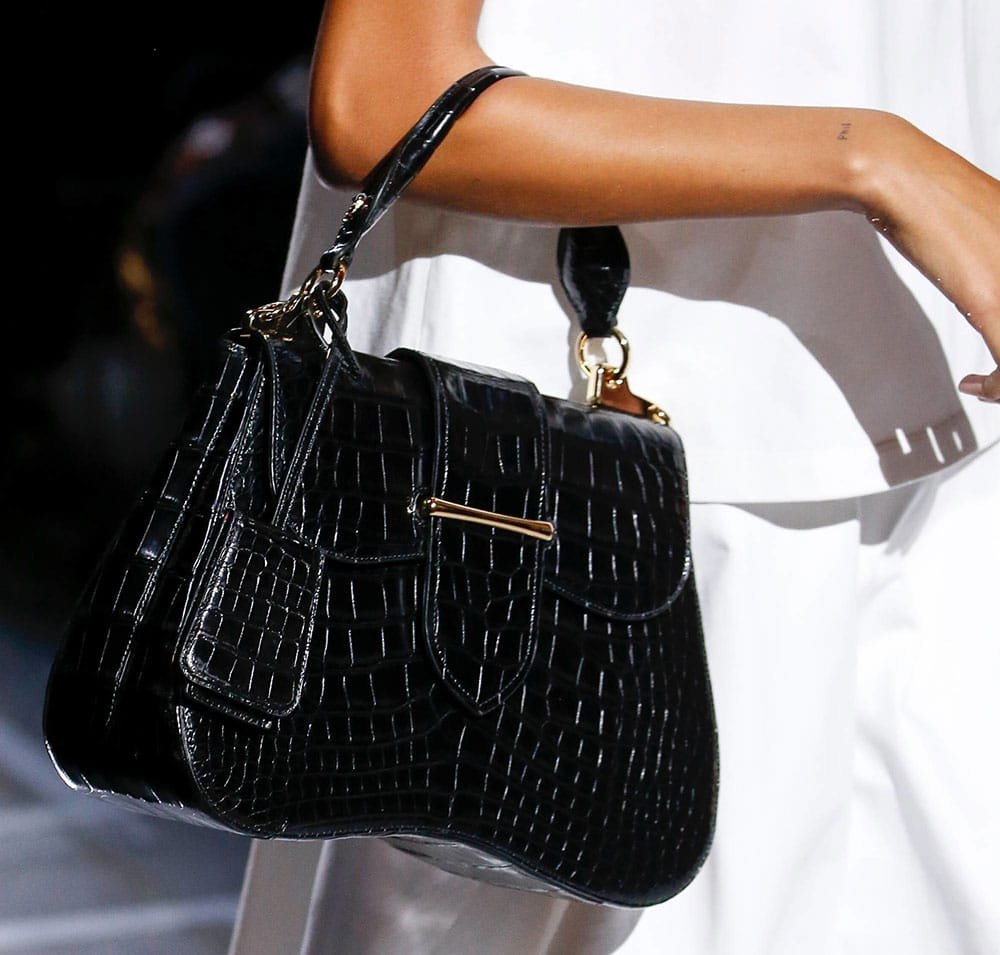 Reference image illustrating Prada Spring 2019 Top Handle and Frame Bags: A Shift Toward Refined Luxury