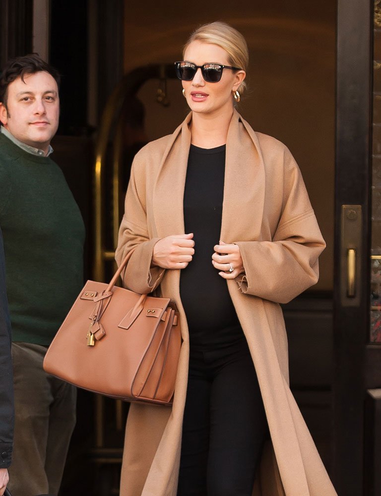 Reference image illustrating Rosie Huntington-Whiteley’s Post-Baby Handbag Rotation: Saint Laurent, Gucci, and Tomasini Favorites