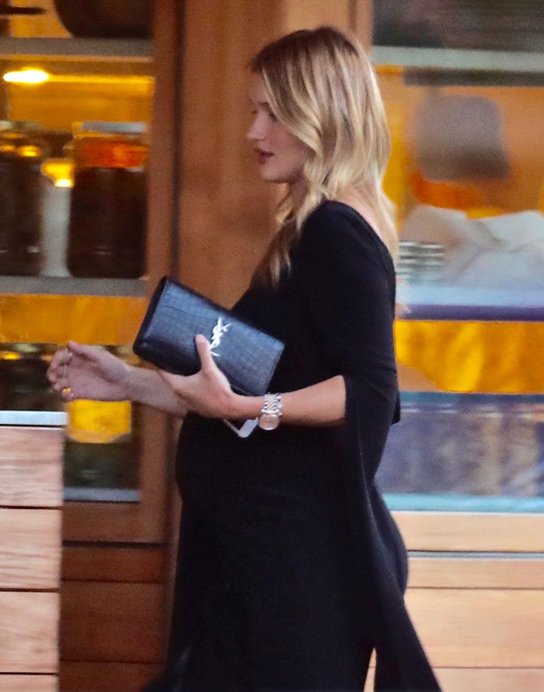 Reference image illustrating Rosie Huntington-Whiteley’s Post-Baby Handbag Rotation: Saint Laurent, Gucci, and Tomasini Favorites