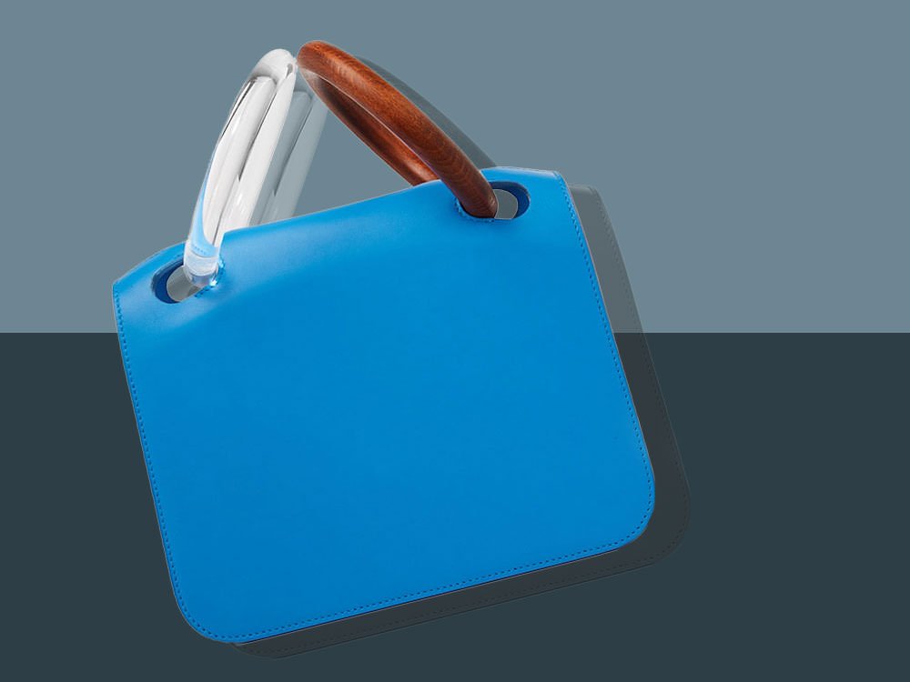 Reference image illustrating The Return of the Hand-Carry Day Bag: Why Luxury Brands Are Ditching Straps