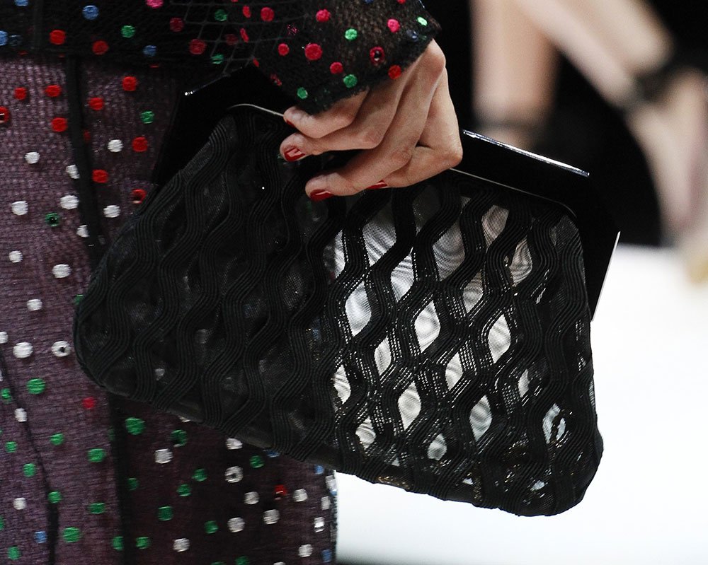 Reference image illustrating Transparent Luxury: The Spring 2018 See-Through Handbag Trend on the Runway