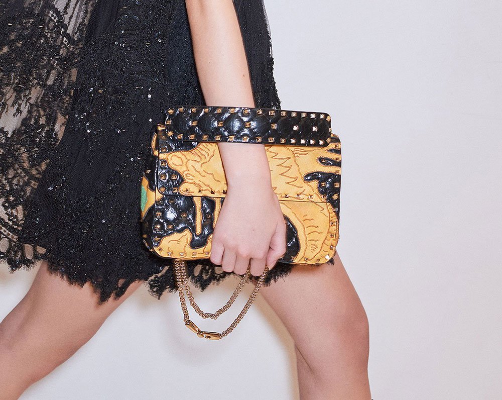 Reference image illustrating Valentino Pre-Fall 2018 Handbags: Rockstud Spikes and Bold New VLTN Logo Bags