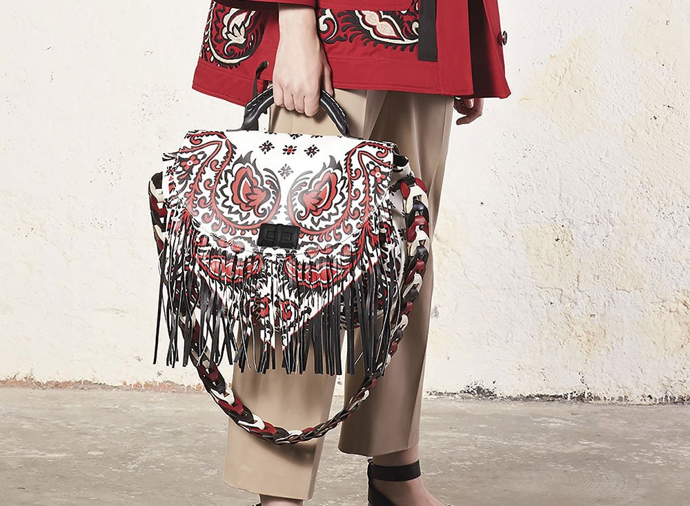 Reference image illustrating Valentino Pre-Fall 2018 Handbags: Rockstud Spikes and Bold New VLTN Logo Bags