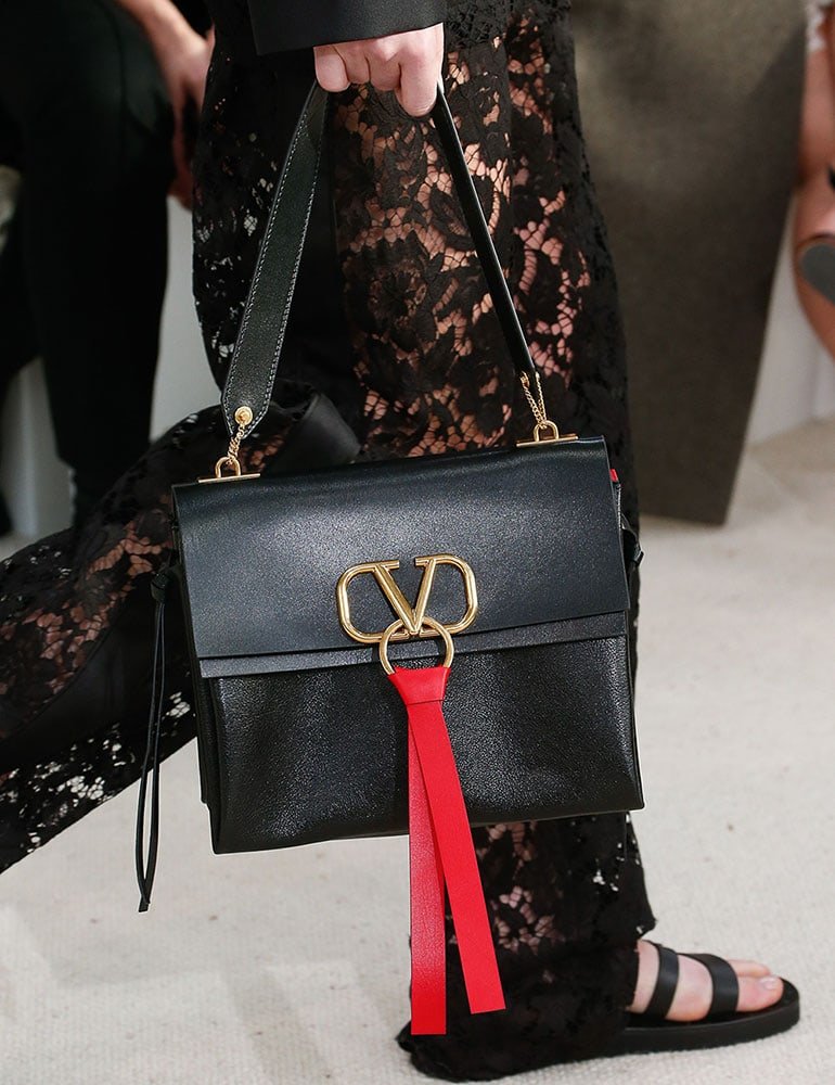 Reference image illustrating Valentino Spring 2019 Handbags: A New Logo Hardware Era Without Rockstuds